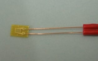 Encapsulated and leaded gauges